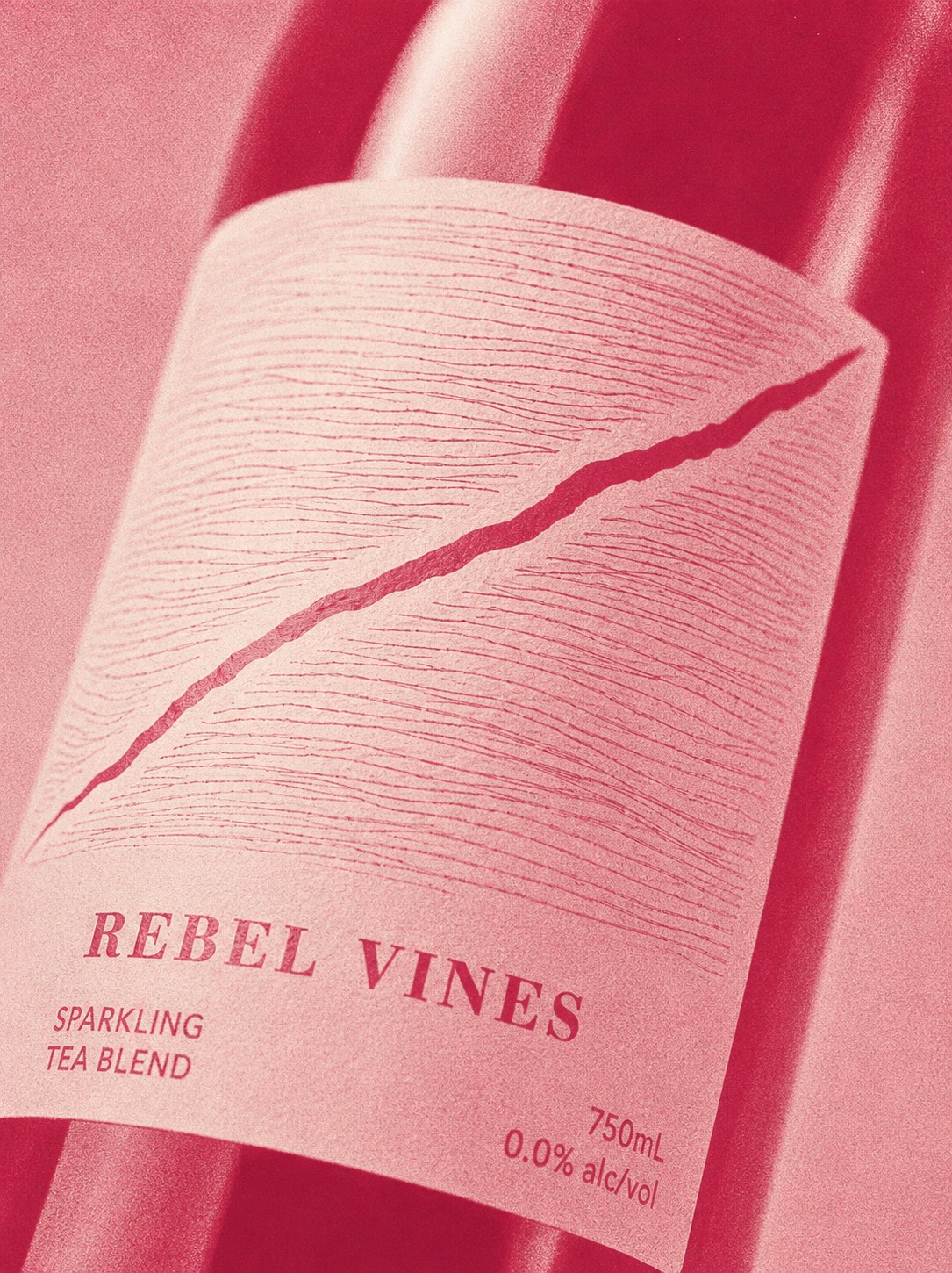 Ripe pink and bone macro photograph of a Rebel Vines bottle label and diagonal graphic.
